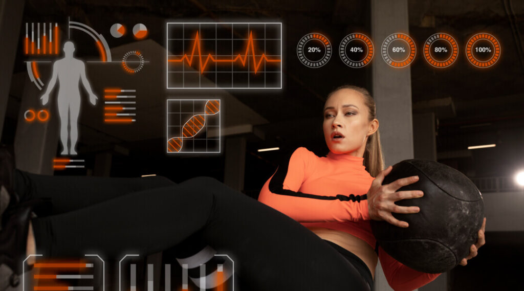 Une femme tient un ballon de médecine devant un écran.